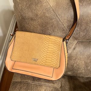 Couch nwot dark tan, over the shoulder hand bag.the flap snaps.